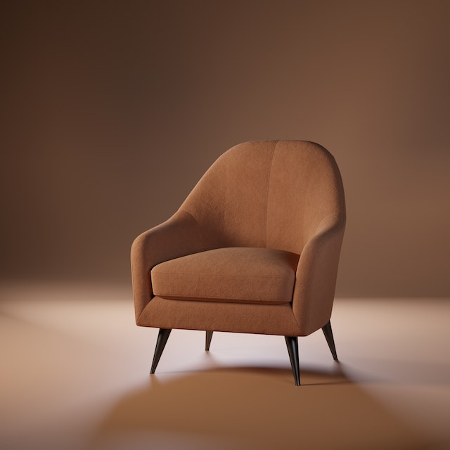 A close-up picture of brown armchair